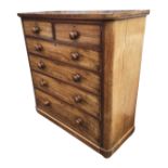 A Victorian mahogany chest of drawers with rectangular rounded top above two short and four long