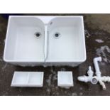 A Villeroy & Boch enamelled double sink with two shaped basins in rectangular slim rounded twin