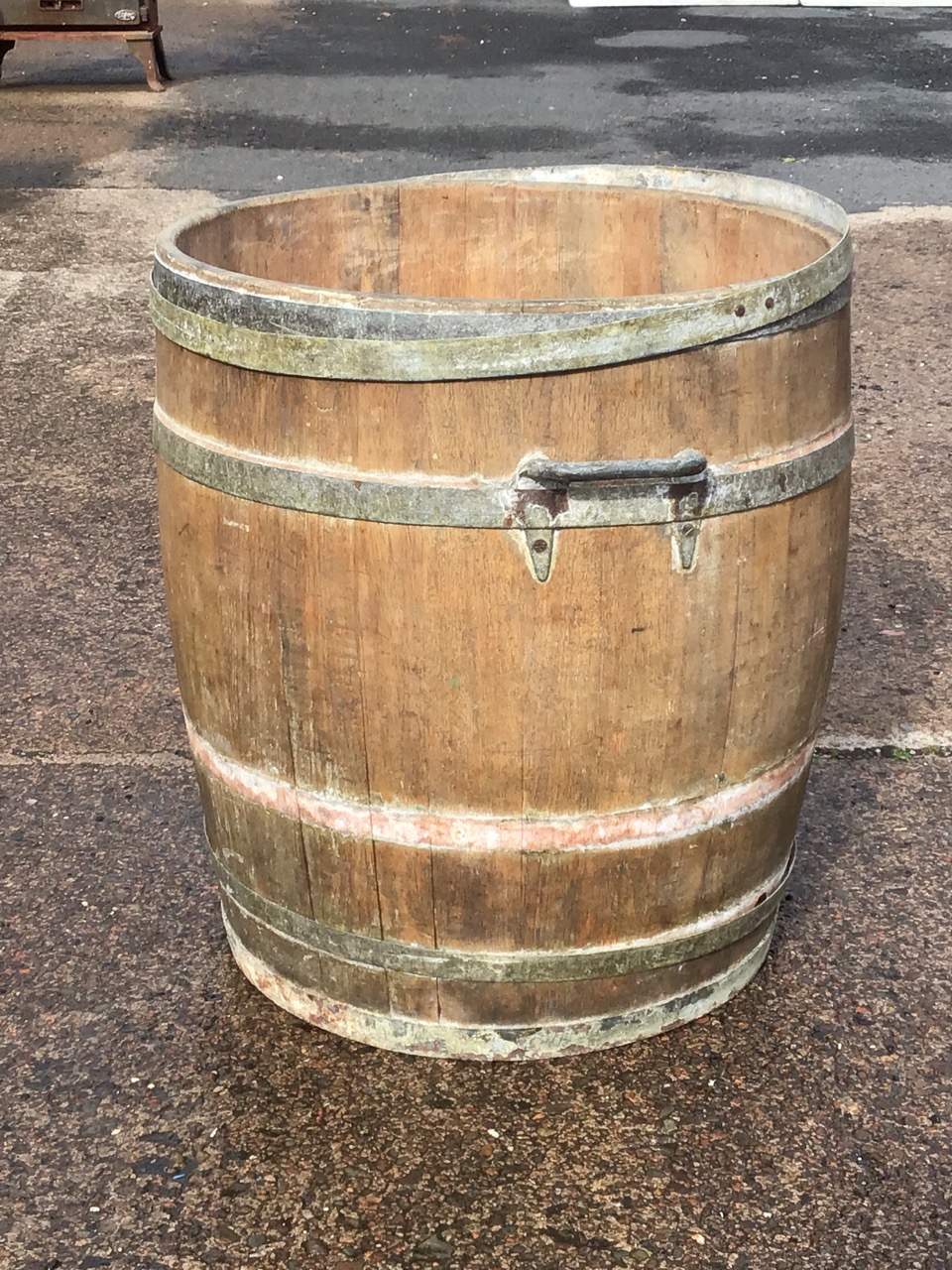 A coopered oak log barrel with iron hoops and carrying handles. (21in x 22in) - Image 2 of 3