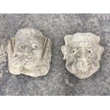A composition stone mask cast as a tudor style head; and another gargoyle type face. (11in) (2)