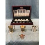 An Elkington cased canteen of silver plated cutlery, eight place settings and serving pieces in