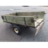 A small 5ft drop-side trailer with oak boards to rectangular box on angleiron frame, with