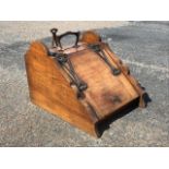 An Edwardian mahogany coal scuttle, with art nouveau patinated copper finish shovel, handle and