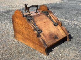 An Edwardian mahogany coal scuttle, with art nouveau patinated copper finish shovel, handle and