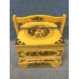 A Chinese painted wood picnic box, with two stacking compartments in a carrying tray, decorated with