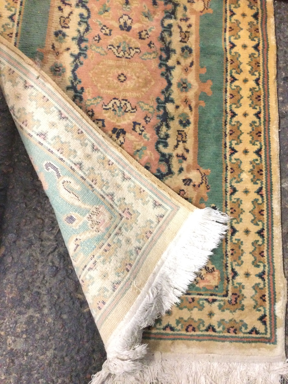 A Persian style wool runner, the green field with three floral medallions and scrolled foliate - Image 3 of 3