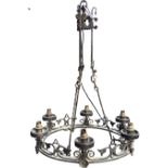 A wrought iron gothic style chandelier, the cylindrical upper section with scrolled and twisted