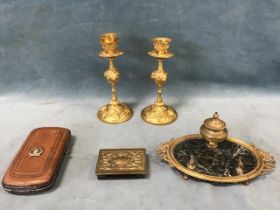 A pair of Victorian renaissance revival ormolu candlesticks; a 19th century French oval ormolu and