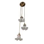 An Edwardian style hanging light fitting, with circular ceiling rose suspending three graduated