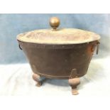 An oval art nouveau copper coal bin, the domed lid embossed with acorns and oak leaves with knob