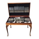 A mahogany cased canteen of silver plated cutlery, the rectangular leather inset top on