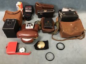 Miscellaneous cased cameras & accessories - a Kodak Brownie, a Brownie Junior, a Vest Pocket camera,