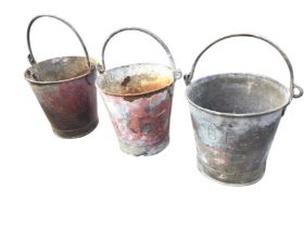 Three British Rail galvanised fire buckets, with swing handles and traces of original painted