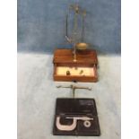 A Victorian mahogany boxed brass demountable set of scales with a variety of brass weights to drawer