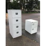 A grey metal four-drawer filing cabinet - 52in; and a Triumph two-drawer filing cabinet - 28in. (2)
