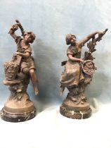 E Moreau, a pair of late nineteenth century spelter bronzed figurines modelled as a girl & boy