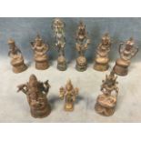 A collection of nine antique Indian bronze figures of Hindu deities - tallest 5in. (9)