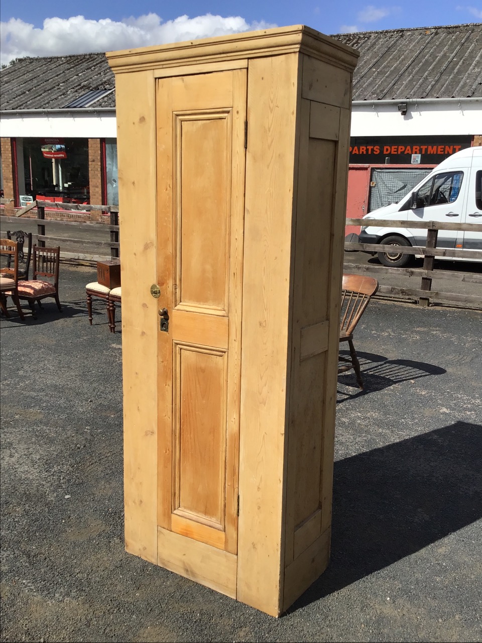 A Victorian pine wardrobe, the moulded cornice above a two-panel door with brass knob, ring handle - Image 3 of 3