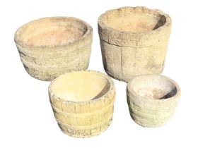 Four similar composition stone garden tubs of moulded barrel type design. (4)