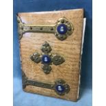 A Victorian burr ash desk blotter, the engraved celtic style brass studded mounts set with