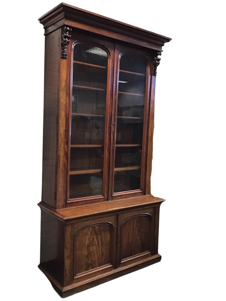 A Victorian mahogany bookcase, the moulded cornice above a pair of arched glazed doors flanked by - Image 3 of 3