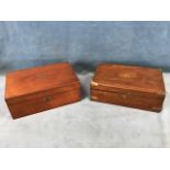 A Victorian rosewood writing slope with brass mounts, opening to a pen tray and ink bottles, the