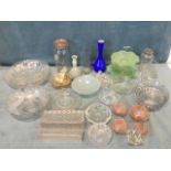 Miscellaneous glass including fruitbowls, vases, a pink deco dressing table set, a carnival