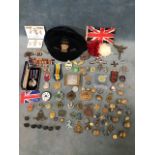 A collection of military, sporting and other cap badges, buttons, medals, ribbons, and enamel