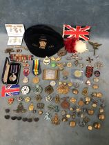 A collection of military, sporting and other cap badges, buttons, medals, ribbons, and enamel