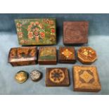 A collection of folk art carved, painted and pyrographed wood trinket boxes - Norwegian, Indian,