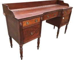 A George IV 6ft mahogany sideboard with plate upstand to rectangular top, having inverted bowfronted