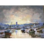 Oil on board, sunset estuary scene with beached boats and village background, signed with initials