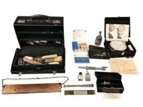 A collection of medical equipment including a morocco leather doctors bag and contents, a boxed