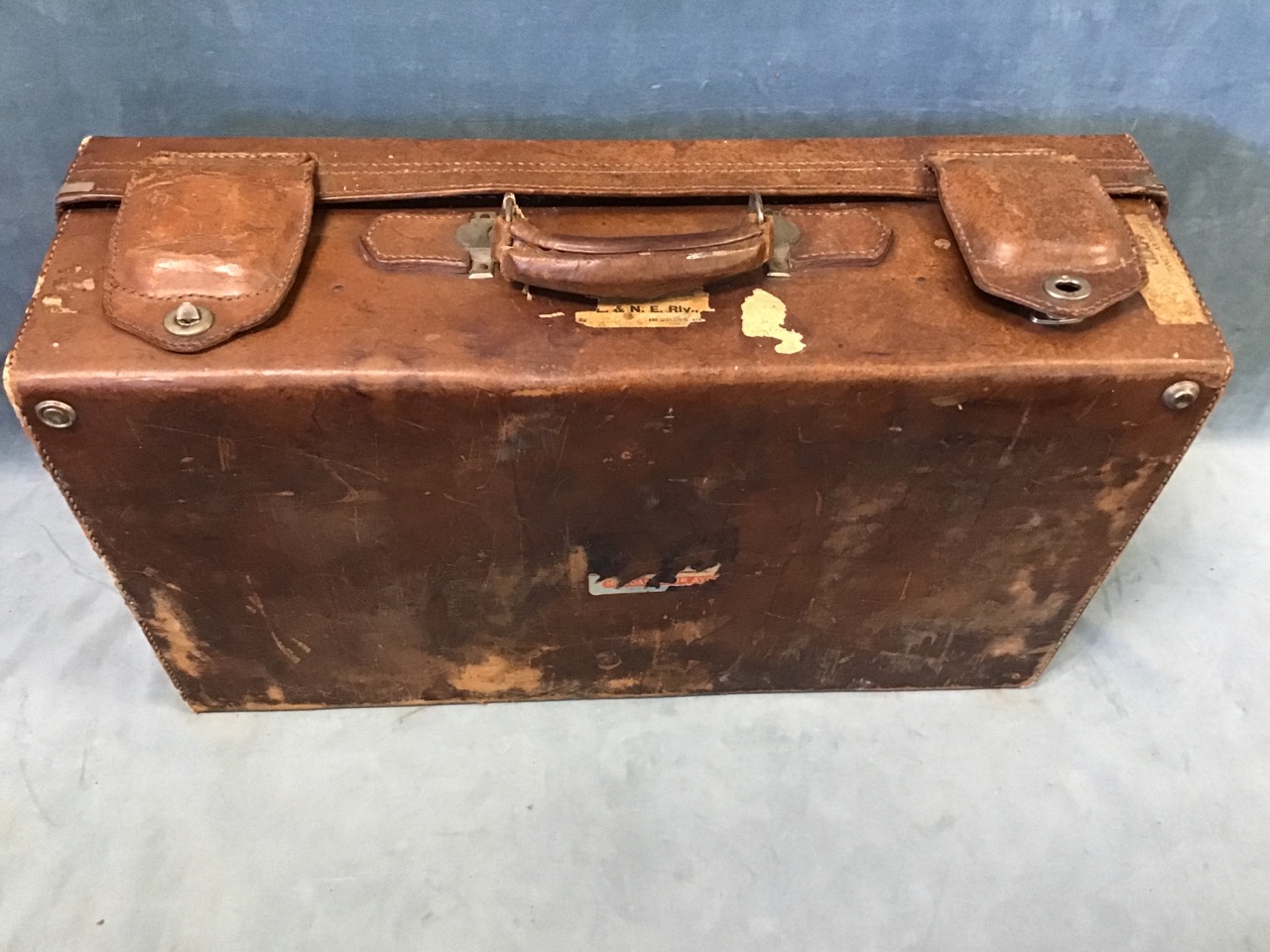 An early 20th century leather suitcase, by Dog Brand, Shanghai, with nickel fittings and leather - Image 3 of 3