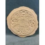 A circular hand carved sandstone celtic knot wall plaque, with quatrefoil interlace design. (13in)