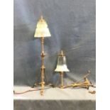 A Victorian arts and crafts WAS Benson style tablelamp, the mouth blown vaseline glass shade on