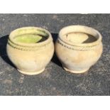 A pair of terracotta bulbous garden pots with ropetwist necks - 13in x 13in x 11in. (2)