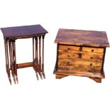 A regency style mahogany nest of tables, the tops with kingwood stringing on turned legs, raised