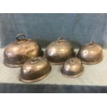 A set of five silver plated graduated oval meat covers by Walker & Hall, Sheffield, with oval ring