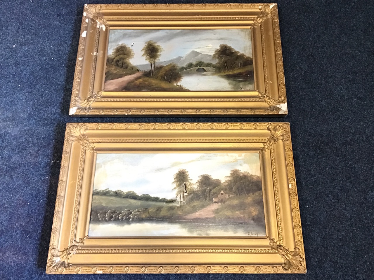Late Victorian oils on canvas, a pair, water landscapes with bridge and waterside house, signed
