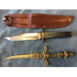 An horn handled Bowie knife by J Nowill & Sons, with studded leather sheath; a pair of Chinese
