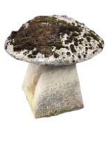 A composition stone garden staddle stone, the mushroom shaped top on a square tapering column. (22in