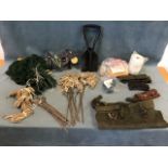 Miscellaneous rabbiting gear including stakes, nets, cartridge belts, twine, a folding shovel,