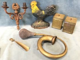 Miscellaneous items - a pair of embossed brass tea caddys & covers, an old brass car horn, a cast