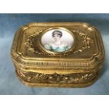 A 19th century French Palais Royal ormolu trinket box, the top inset with a miniature watercolour