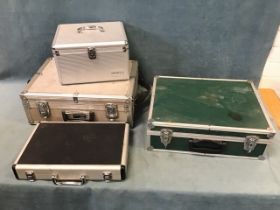 A Tornado CD flight case; a laptop case; an EN-Gee padded equipment case with shoulder strap;