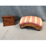 A nineteenth century miniature chest with six small knobbed drawers; and a square upholstered walnut