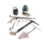 Miscellaneous tools - peat spades, spanners, a two-man log saw, a Makita bench saw, a coal scuttle