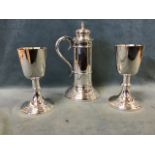 A pair of Mappin & Webb silver plated chalices, the bowls with gilt interiors, on knopped stems