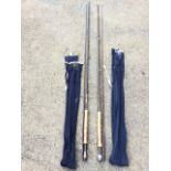 A Hardy two-piece 10ft 6in Graphite Deluxe fly rod with cloth sleeve; and a Hardy two-piece
